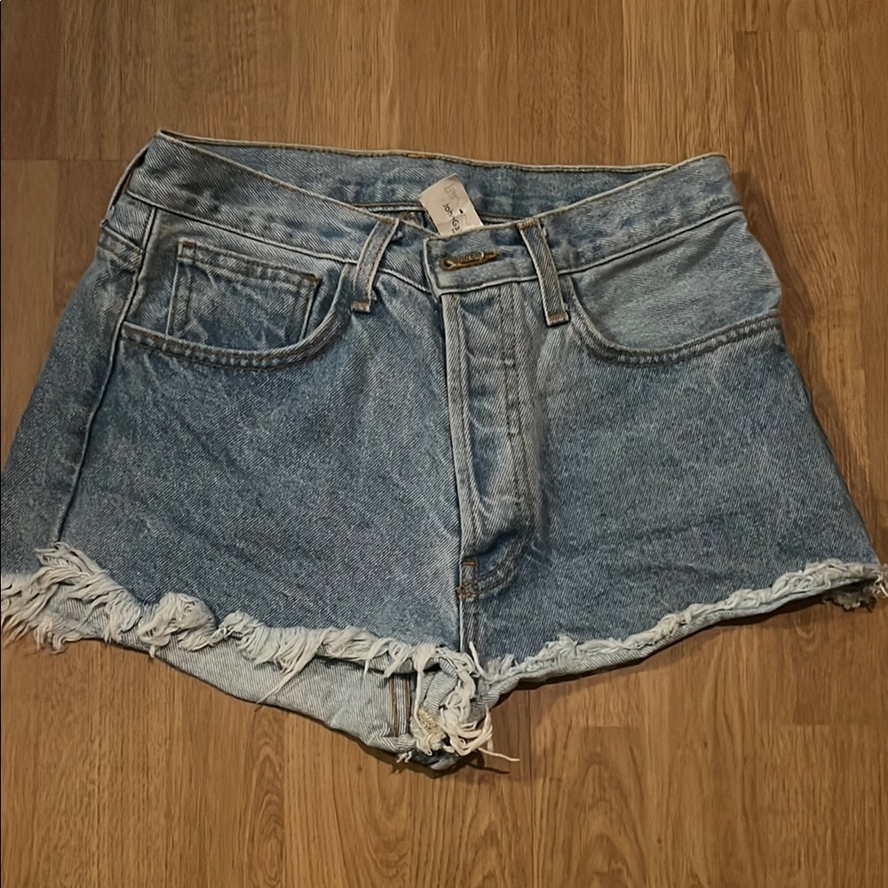 Brandy Melville embroidered denim shorts.